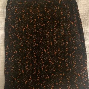 Lularoe XL stretchy pencil skirt, knee length. Black & orange design very comfy
